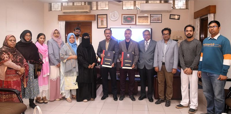 Group photo after exchanging signed agreement folders